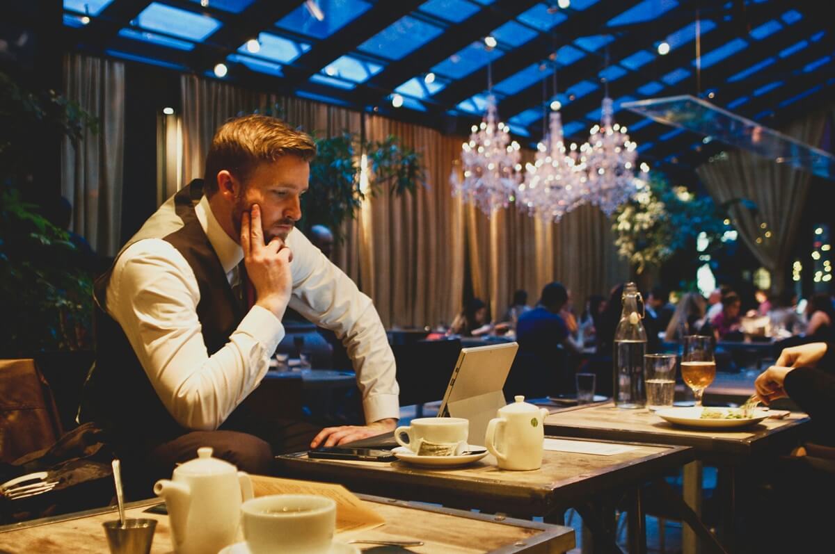 Business Traveler Having a Coffee